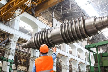 man-standing-beside-heavy-equipment-2760242.jpg